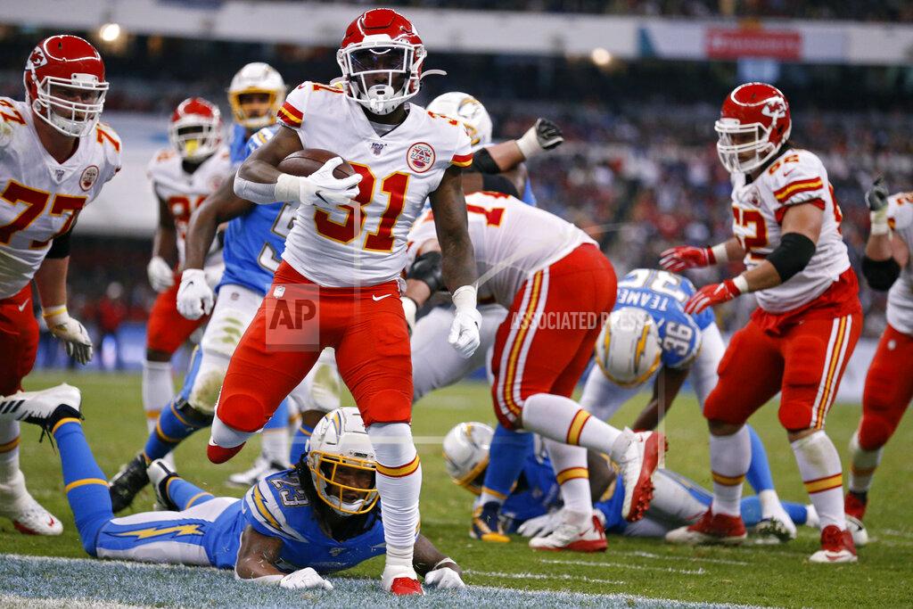 Rebecca Blackwell Kansas City Chiefs running back Darrel Williams scores a touchdown during the second half of an NFL football game against the Los Angeles Chargers, Monday, Nov. 18, 2019, in Mexico City. (AP Photo/Rebecca Blackwell)