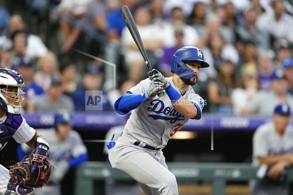 David Zalubowski Los Angeles Dodgers' Eddy Alvarez watches his RBI single off Colorado Rockies starting pitcher German Marquez during the fourth inning of a baseball game Wednesday, June 29, 2022, in Denver. (AP Photo/David Zalubowski)