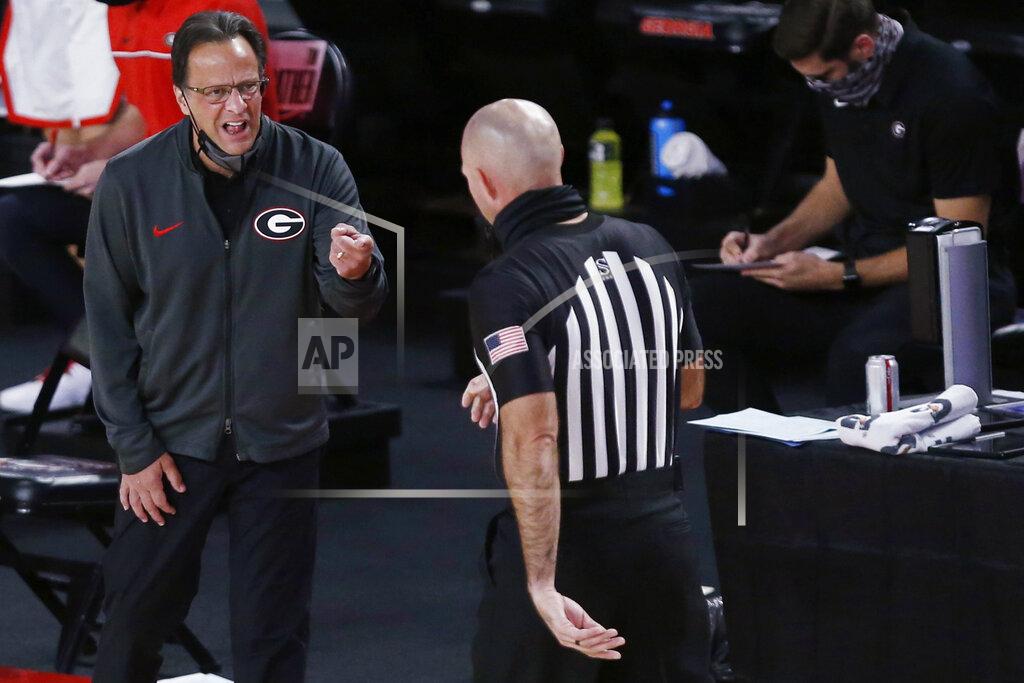 Joshua L. Jones Georgia coach Tom Crean speaks to a referee during the team's NCAA college basketball game exhibition game against North Georgia in Athens, Ga., Wednesday, Dec. 2, 2020. (Joshua L. Jones/Athens Banner-Herald via AP)