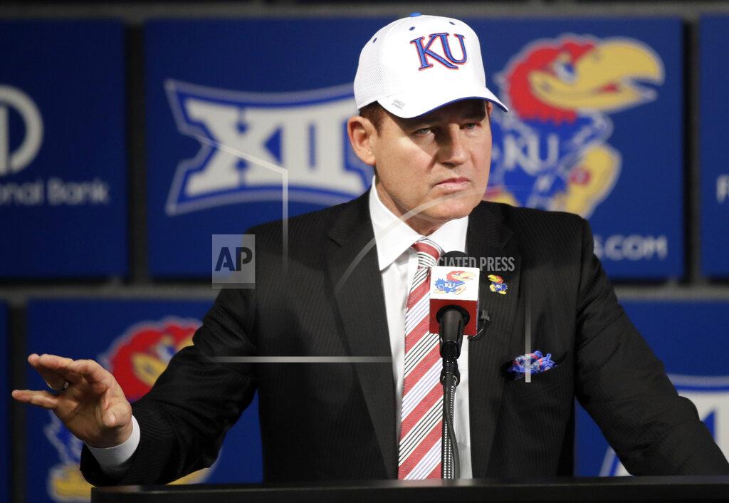 Orlin Wagner FILE - In this Nov. 18, 2018, file photo, University of Kansas new NCAA college football coach Les Miles makes a statement during a news conference in Lawrence, Kan. Miles and Kansas State counterpart Chris Klieman wrap up their initial recruiting classes, both having hit the ground running in their new gigs. (AP Photo/Orlin Wagner, File)
