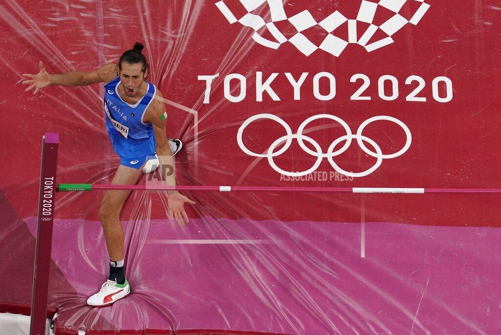 Morry Gash Gianmarco Tamberi, of Italy, competes during the finals of the men's high jump at the 2020 Summer Olympics, Sunday, Aug. 1, 2021, in Tokyo. (AP Photo/Morry Gash)