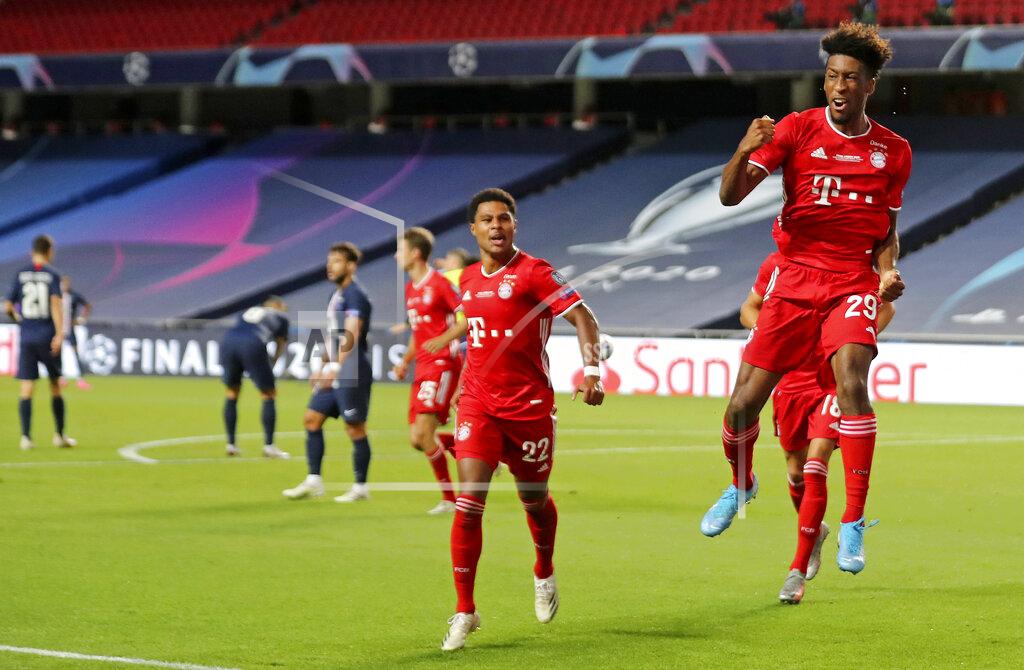 Miguel A. Lopes Bayern's Kingsley Coman, right, celebrates with teammates after scoring his sides first goal during the Champions League final soccer match between Paris Saint-Germain and Bayern Munich at the Luz stadium in Lisbon, Portugal, Sunday, Aug. 23, 2020. (Miguel A. Lopes/Pool via AP)