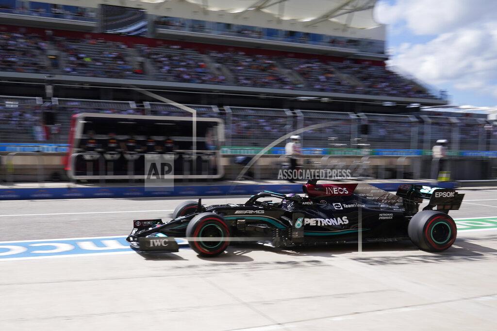 Darron Cummings Mercedes driver Lewis Hamilton, of Britain, pulls out of the pits during a practice session for the Formula One U.S. Grand Prix auto race at the Circuit of the Americas, Saturday, Oct. 23, 2021, in Austin, Texas. (AP Photo/Darron Cummings)
