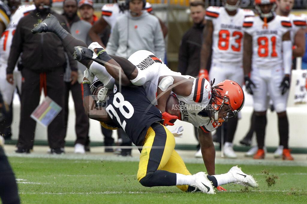 Gene J. Puskar Pittsburgh Steelers cornerback Mike Hilton (28) tackles Cleveland Browns running back Kareem Hunt (27) in the first half of an NFL football game, Sunday, Dec. 1, 2019, in Pittsburgh. (AP Photo/Gene J. Puskar)
