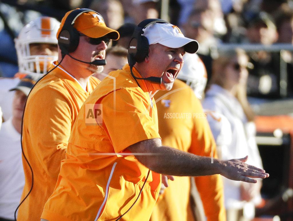 Mark Humphrey Tennessee head coach Jeremy Pruitt yells to his players in the first half of an NCAA college football game against Vanderbilt, Saturday, Nov. 24, 2018, in Nashville, Tenn. (AP Photo/Mark Humphrey)
