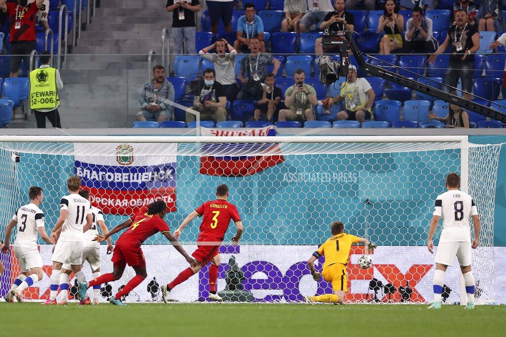 Lars Baron Belgium's Thomas Vermaelen scores his side's first goal during the Euro 2020 soccer championship group B match between Finland and Belgium at Saint Petersburg stadium, in St. Petersburg, Russia, Monday, June 21, 2021. (Lars Baron/Pool via AP)