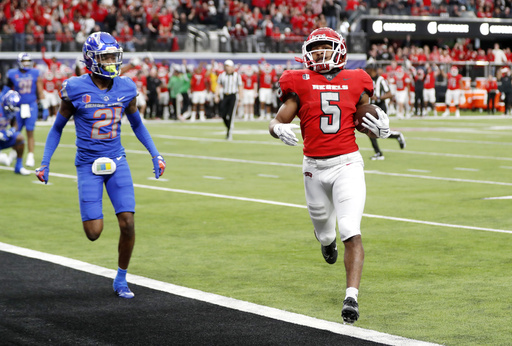 Rising programs Kansas and UNLV to meet in Guaranteed Rate Bowl - Vimarsana News