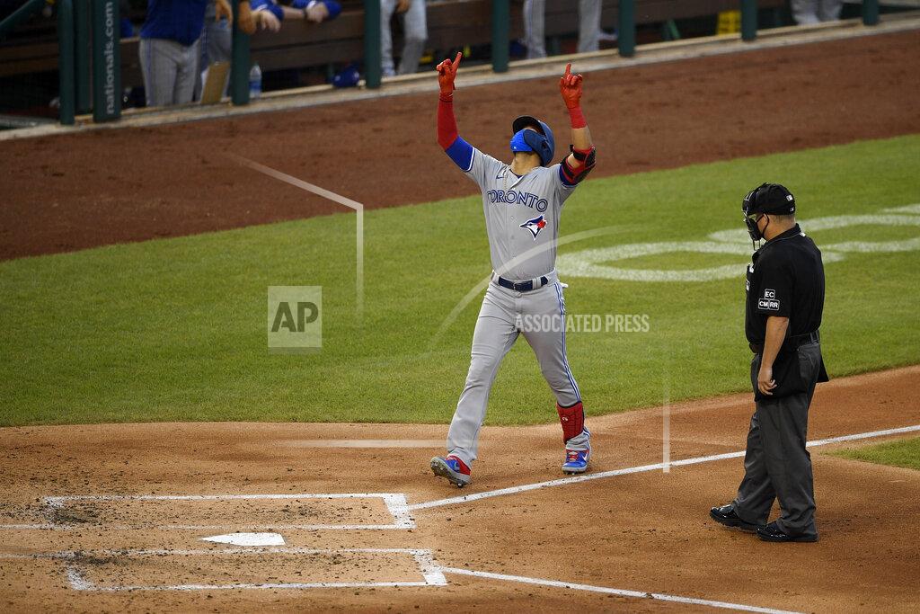 Nick Wass Toronto Blue Jays' Lourdes Gurriel Jr. celebrates his home run during the fourth inning of a baseball game against the Washington Nationals, Tuesday, July 28, 2020, in Washington. (AP Photo/Nick Wass)