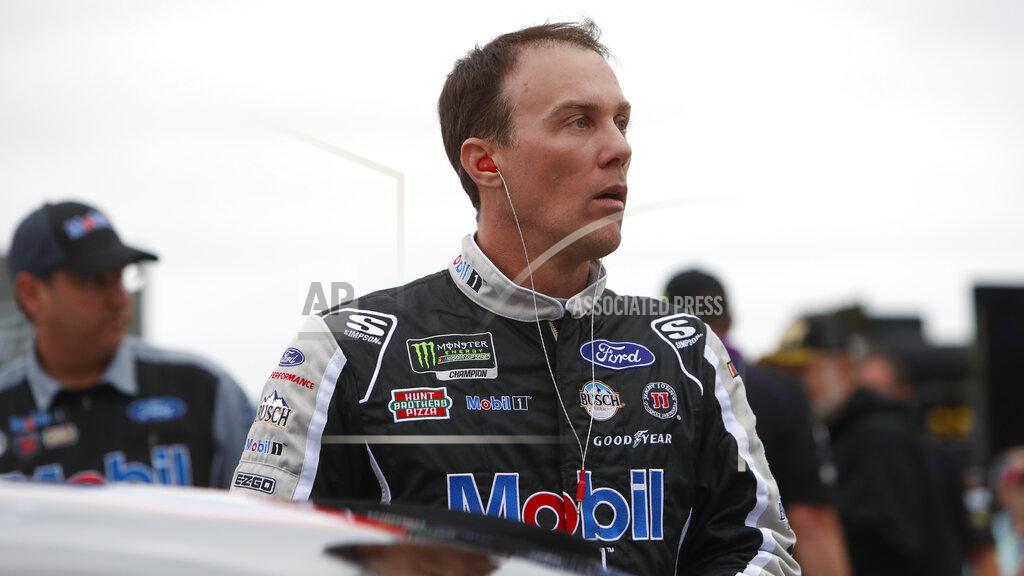 Lm Otero Kevin Harvick prepares to qualify for the NASCAR Cup Series auto race at Texas Motor Speedway in Fort Worth, Texas, Friday, March 29, 2019. Harvick won't be moving to the Fox Sports broadcast booth next year if Darrell Waltrip retires. Harvick said Friday that he's not getting out of the race car and is comfortable where he's at both on and off the track. (AP Photo/LM Otero)