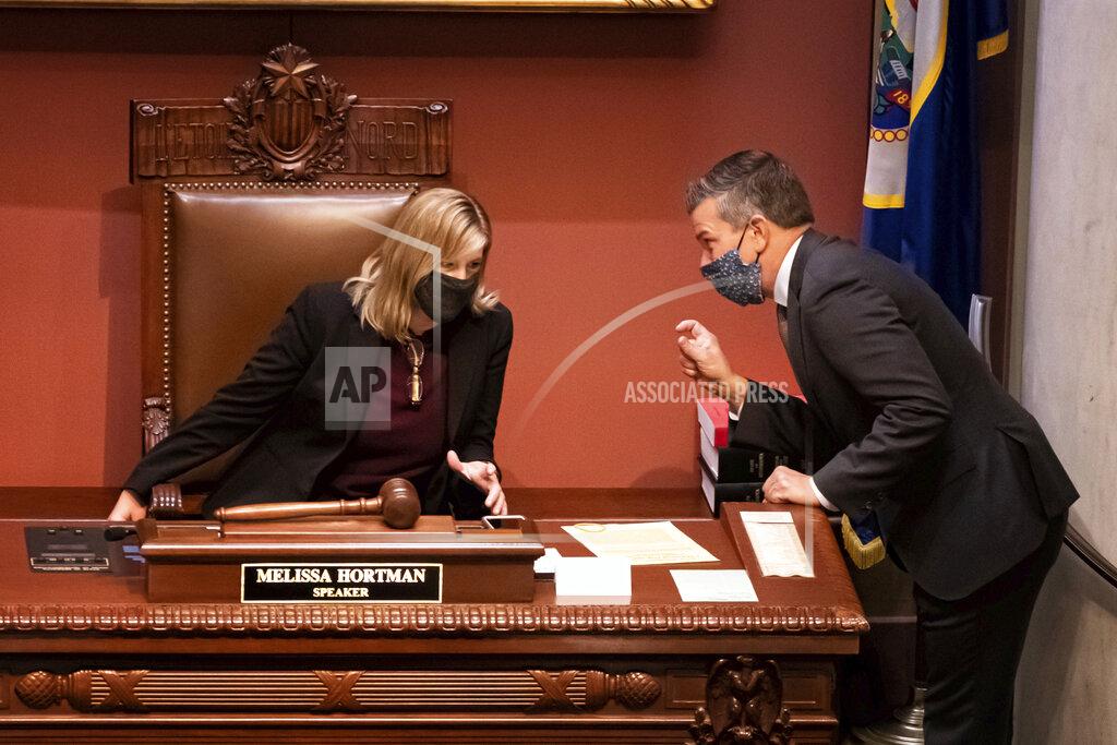Glen Stubbe After speaking with Republican legislators on the floor, House Majority Leader Ryan Winkler, DFL-Golden Valley talks with House Speaker Melissa Hortman, DFL-Brooklyn Park, just before the start of a special session, Wednesday, Oct. 14, 2020, in St. Paul, Minn. Democrats are looking for ways to finally pass a bonding bill this year. (Glen Stubbe/Star Tribune via AP)
