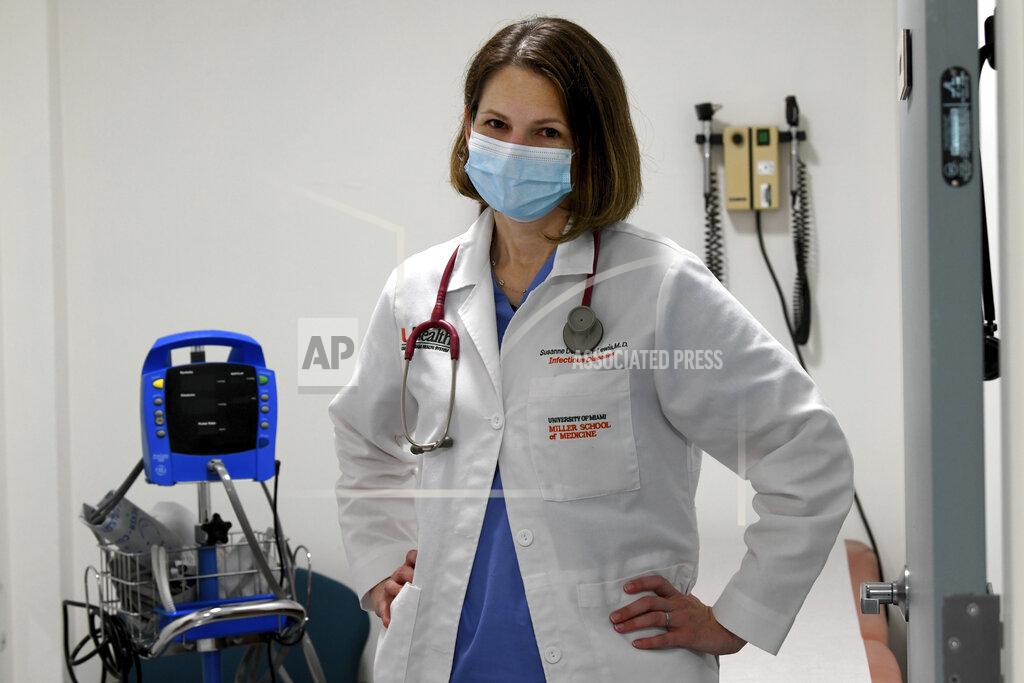 Taimy Alvarez University of Miami Miller School of Medicine Infectious Diseases Dr. Susanne Doblecki-Lewis, stands inside an exam room in Miami, Fla., Wednesday, Sept. 2, 2020. Doblecki-Lewis is leading the research on the National Institutes of Health-funded Moderna COVID-19 vaccine third phase of a clinical trial. “It’s really important that this vaccine work for everyone, or if it doesn’t, that we understand why,” she says. (AP Photo/Taimy Alvarez)