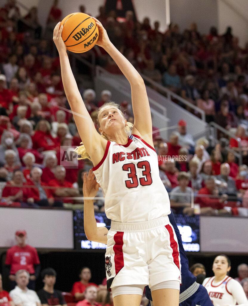 Ben Mckeown North Carolina State's Elissa Cunane (33) gathers a rebound during the second half of a college basketball game against Longwood in the first round of the NCAA tournament in Raleigh, N.C., Saturday, March 19, 2022. (AP Photo/Ben McKeown)