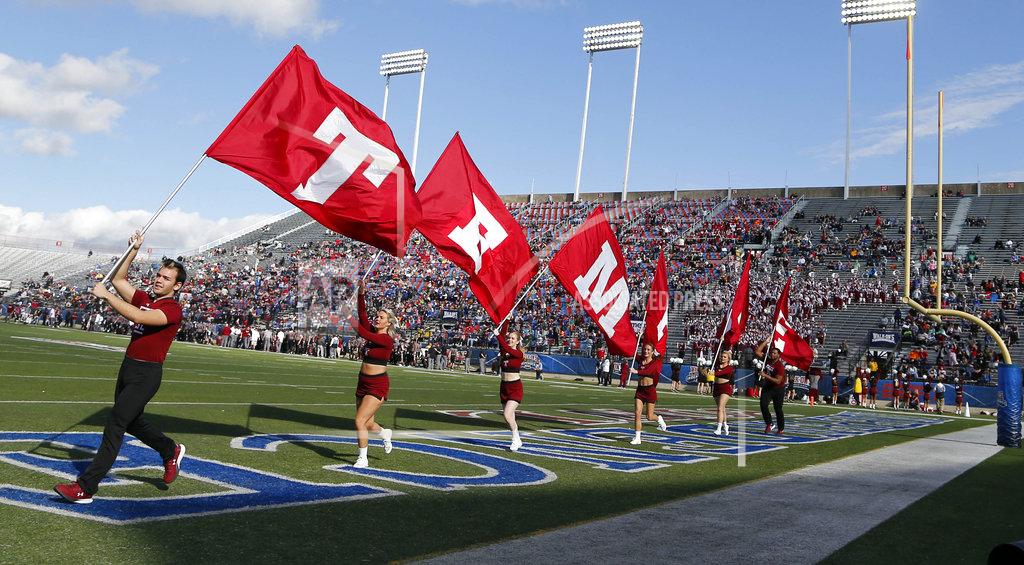 Rogelio V. Solis Temple cheerleaders celebrate a first-half score against Duke in the Independence Bowl NCAA college football game in Shreveport, La., Thursday, Dec. 27, 2018. (AP Photo/Rogelio V. Solis)