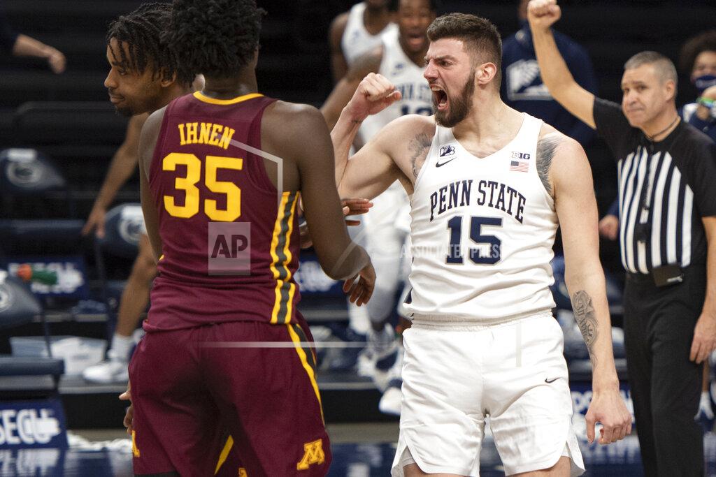 Noah Riffe Penn State forward Trent Buttrick (15) reacts after dunking against Minnesota during an NCAA college basketball game Wednesday, March 3, 2021, in State College, Pa. (Noah Riffe/Centre Daily Times via AP)