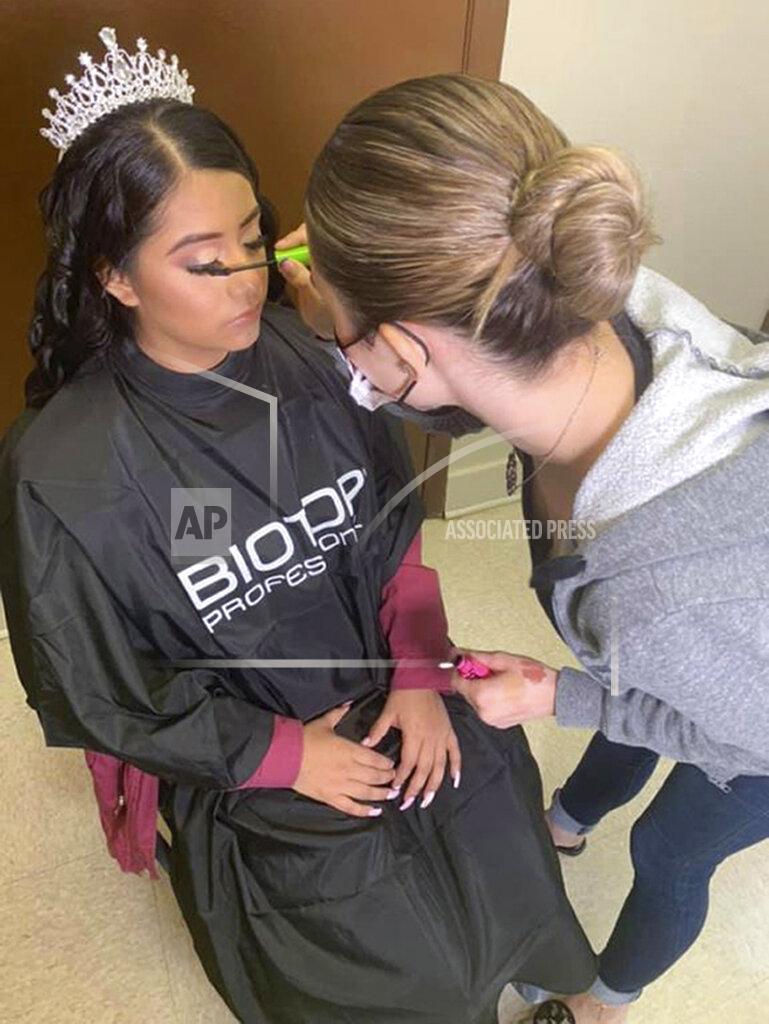 Uncredited In this February 2021 photo provided by Caring Place@ Miami Rescue Mission, Adriana Palma gets ready for her quinceanera, her 15th birthday celebration. Quinceaneras are revered in Hispanic culture and celebrated with all the gusto of a wedding. But after her father lost his job, Adriana said, “I lost all hope of having one.” (Caring Place@ Miami Rescue Mission via AP)