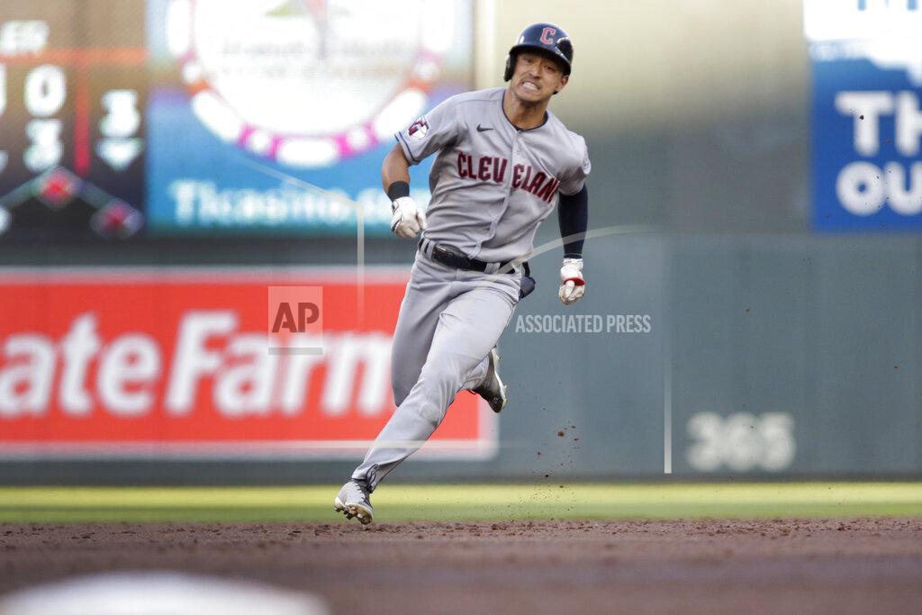 Andy Clayton-King Cleveland Guardians' Steven Kwan runs to third base on an RBI triple against the Minnesota Twins during the third inning of a baseball game Wednesday, June 22, 2022, in Minneapolis. (AP Photo/Andy Clayton-King)