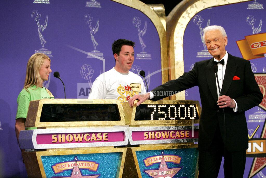 Kevork Djansezian FILE - Host Bob Barker appears with contestants during filming of a special prime-time episode of "The Price Is Right," in Los Angeles on April 17, 2007. The longest-running game show in television history is celebrating it’s 50th season. (AP Photo/Kevork Djansezian, File)