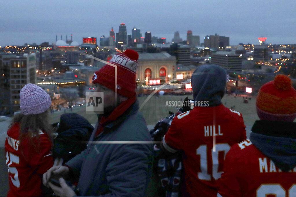 Charlie Riedel People gather at the Liberty Memorial as they wait for a parade through downtown Kansas City, Mo. to celebrate the Kansas City Chiefs victory in NFL's Super Bowl 54 Wednesday, Feb. 5, 2020. (AP Photo/Charlie Riedel)