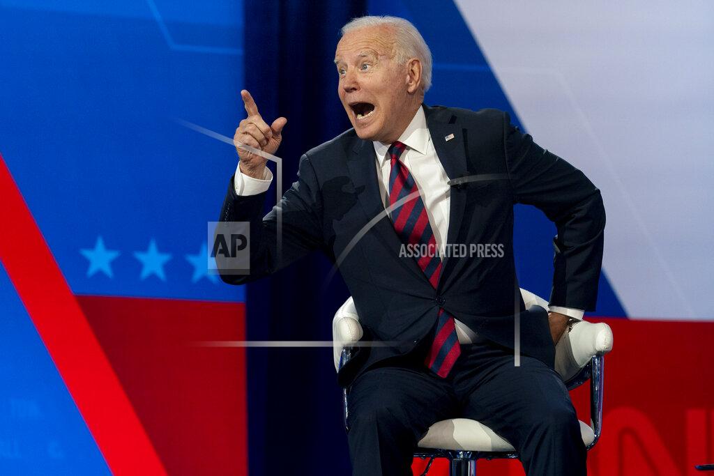 Andrew Harnik President Joe Biden interacts with members of the audience during a commercial break for a CNN town hall at Mount St. Joseph University in Cincinnati, Wednesday, July 21, 2021. (AP Photo/Andrew Harnik)