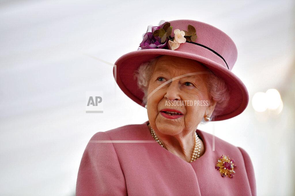 Ben Stansall FILE - In this Thursday Oct. 15, 2020 file photo, Britain's Queen Elizabeth II visits the Defence Science and Technology Laboratory (DSTL) at Porton Down, England, to view the Energetics Enclosure and display of weaponry and tactics used in counter intelligence. The death of Prince Philip has left a “huge void” in Queen Elizabeth II’s life, their son Prince Andrew said Sunday April 11, 2021, as well-wishers continued to leave floral tributes outside the gates of royal residences in memory of the monarch's husband. (Ben Stansall/Pool via AP, file)