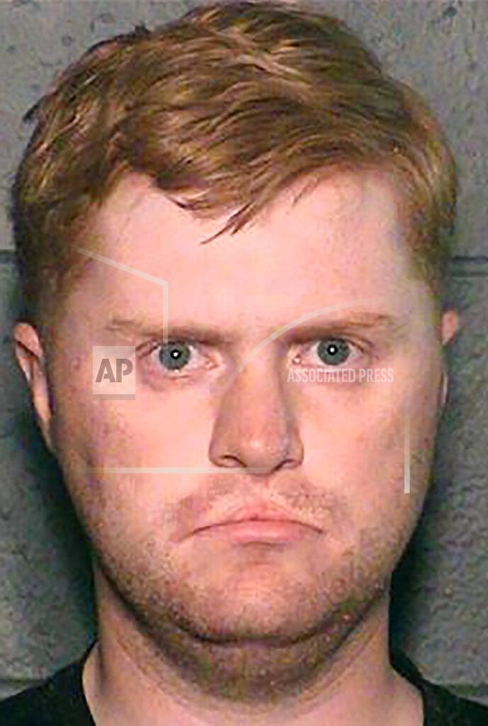 FILE - This undated photo provided by the Riley County (Kansas) Police Department shows Jarrett Smith. Smith, a former U.S. soldier described by prosecutors as a Satanist has been sentenced to 2 1/2 years in federal prison for distributing information through social media about building a bomb and making napalm. A federal judge on Wednesday, Aug. 19, 2020, rejected a request from Smith's attorney for a lenient sentence of 15 months. Smith pleaded guilty in February to two felony charges of distributing explosives information. (Riley County Police Department via AP,File)