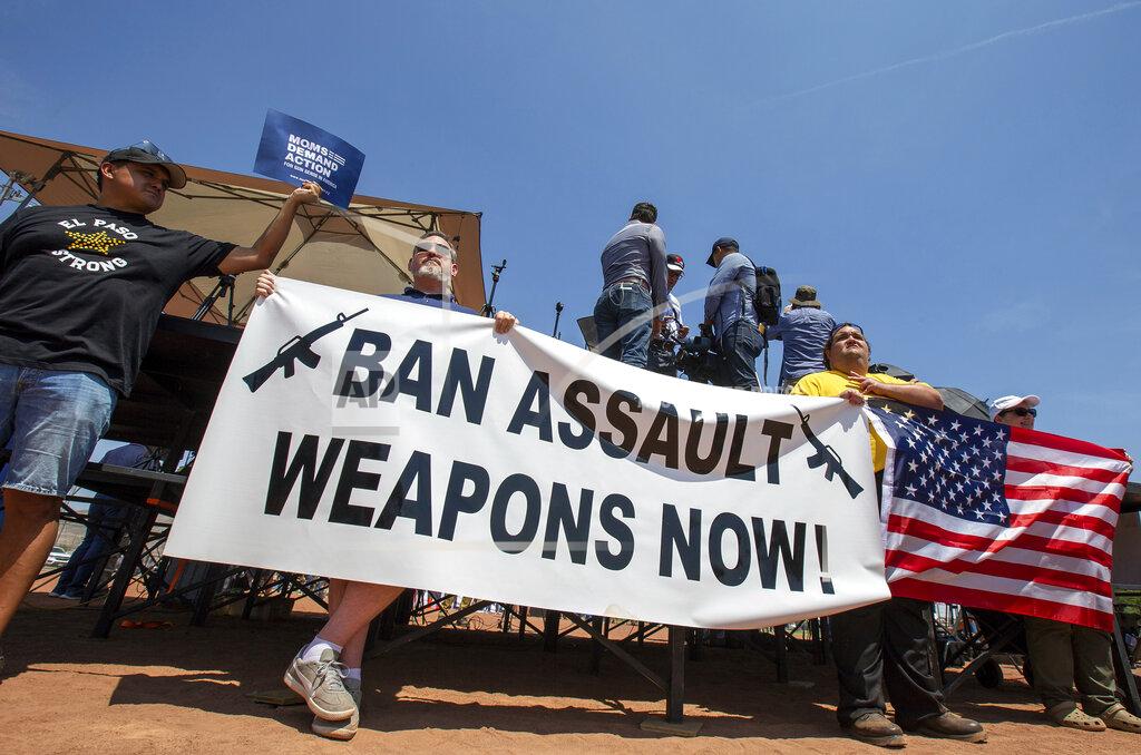 Andres Leighton FILE - Demonstrators hold a banner to protest the visit of President Donald Trump to the border city after the Aug. 3 mass shooting in El Paso, Texas, on Aug. 7, 2019. A gunman killing multiple elementary school children and adults in Texas on Tuesday, May 24, 2022, adds to the state's grim recent history of mass shootings. (AP Photo/Andres Leighton, File)
