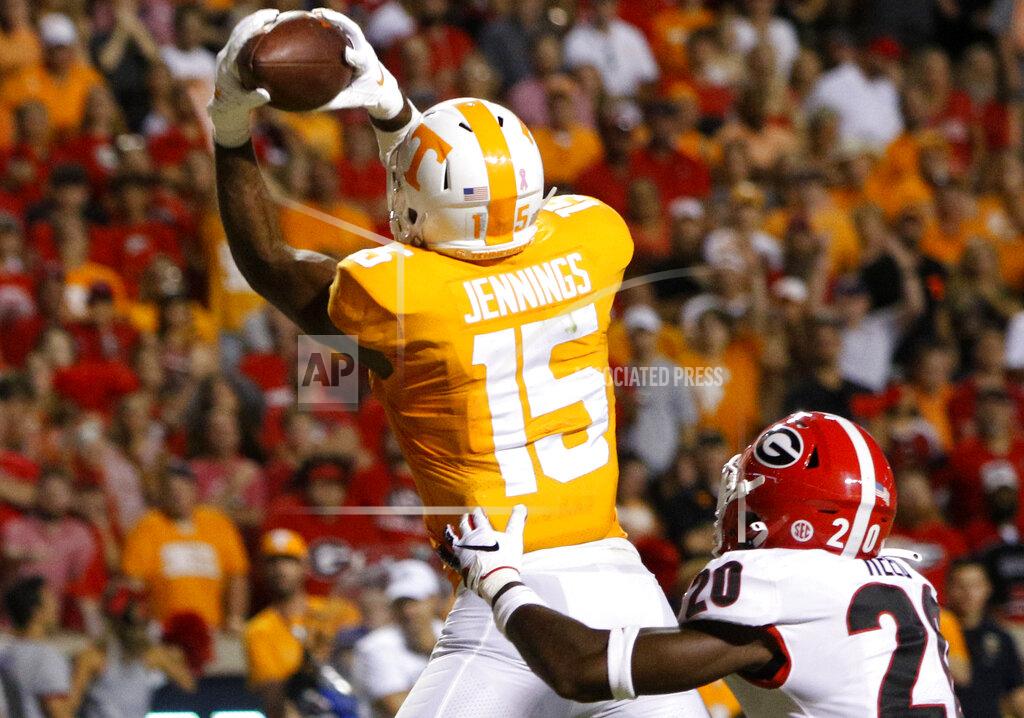C.b. Schmelter Tennessee wide receiver Jauan Jennings (15) pulls in a 12-yard touchdown against Georgia defensive back J.R. Reed (20) at Neyland Stadium on Saturday, Oct. 5, 2019 in Knoxville, Tenn.(C.B. Schmelter/Chattanooga Times Free Press via AP)