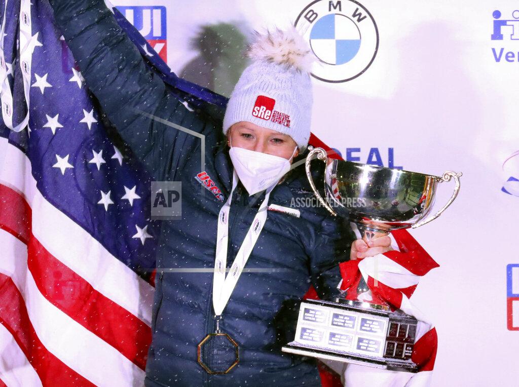 Matthias Schrader Kaillie Humphries of the United States celebrate after winning with Lolo Jones the two women's bobsleigh race at the Bobsleigh and Skeleton World Championships in Altenberg, Germany, Saturday, Feb. 6, 2021. (AP Photo/Matthias Schrader)
