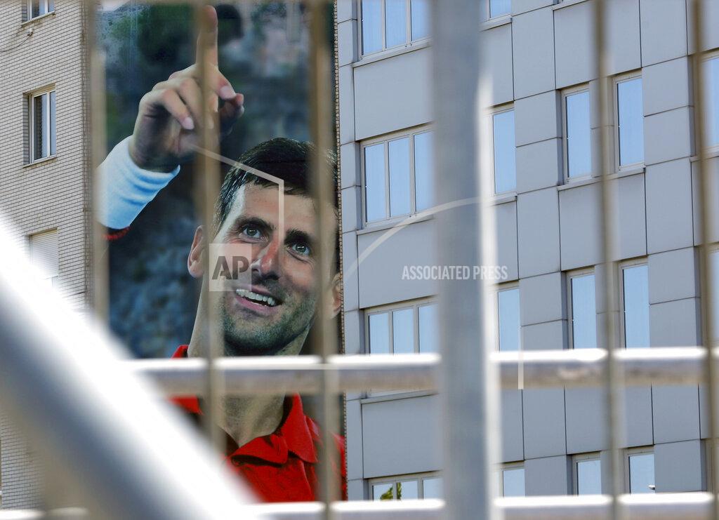 Darko Vojinovic A billboard depicting Serbian tennis player Novak Djokovic is seen on a building in Belgrade, Serbia, Wednesday, June 24, 2020. Djokovic has tested positive for the coronavirus after taking part in a tennis exhibition series he organized in Serbia and Croatia. The top-ranked Serb is the fourth player to test positive for the virus after first playing in Belgrade and then again last weekend in Zadar, Croatia.(AP Photo/Darko Vojinovic)