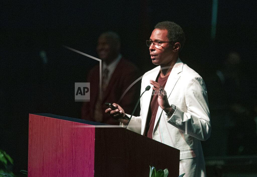 Mark Wallheiser 1993 Heisman quarterback Charlie Ward eulogizes longtime Florida State University football coach Bobby Bowden as Bowden lies in repose at the Tucker Civic Center during a public celebration of life, Saturday, Aug. 14, 2021, in Tallahassee, Fla. Bowden became the FSU football coach in 1976, transforming the program into one of the best in the country. He coached FSU to national championships in 1993 and 1999. Bowden was 91. (AP Photo/Mark Wallheiser)