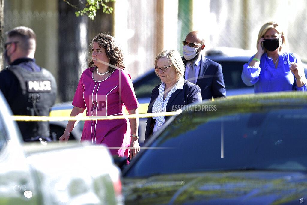 Calvin Mattheis Knoxville Mayor Indya Kincannon, left, arrives at the scene of a shooting at Austin-East High School in Knoxville, Tenn. on Monday, April 12, 2021. (Calvin Mattheis/Knoxville News Sentinel via AP)