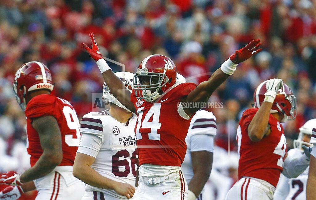 Butch Dill FILE - In this Nov. 10, 2018, file photo, Alabama defensive back Deionte Thompson (14) celebrates after Mississippi State place kicker Jace Christmann (47) missed a field goal-attempt during the first half of a game, in Tuscaloosa, Ala. Thompson is a possible pick in the 2019 NFL Draft. (AP Photo/Butch Dill, File)
