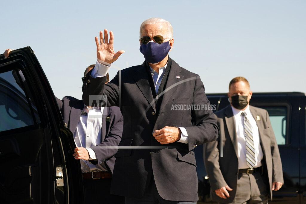Carolyn Kaster Democratic presidential candidate former Vice President Joe Biden arrives to board his campaign plane at the New Castle Airport in New Castle, Del., Sunday, Oct. 18, 2020, en route to Durham, N.C. (AP Photo/Carolyn Kaster)