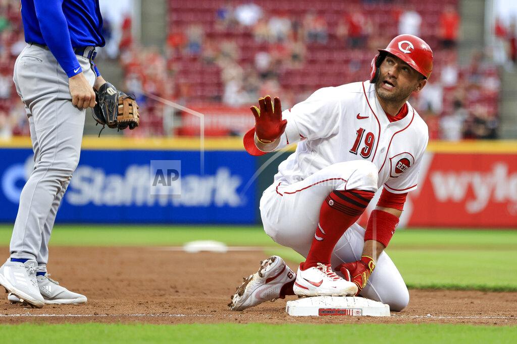 Aaron Doster Cincinnati Reds' Joey Votto gestures for a timeout after hitting a two-run triple against the Chicago Cubs during the third inning of a baseball game in Cincinnati, Wednesday, May 25, 2022. (AP Photo/Aaron Doster)