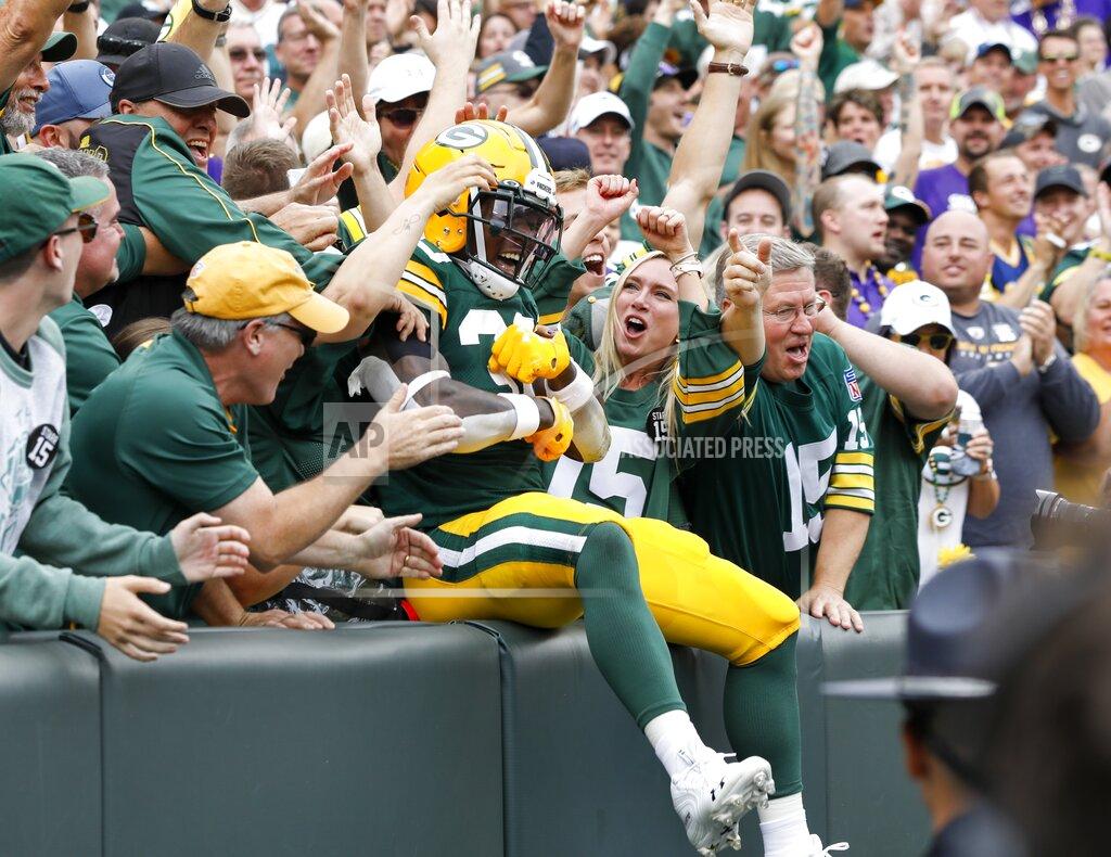 Mike Roemer Green Bay Packers' Jamaal Williams celebrates his touchdown during the first half of an NFL football game against the Minnesota Vikings Sunday, Sept. 15, 2019, in Green Bay, Wis. (AP Photo/Mike Roemer)