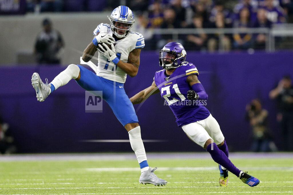 Andy Clayton-King Detroit Lions wide receiver Marvin Jones catches a pass ahead of Minnesota Vikings cornerback Mike Hughes, right, during the first half of an NFL football game, Sunday, Dec. 8, 2019, in Minneapolis. (AP Photo/Andy Clayton-King)