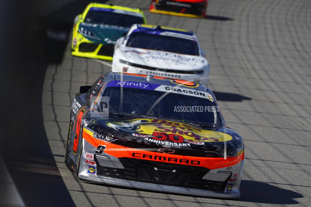 Paul Sancya Noah Gragson (9) races during the NASCAR Xfinity Series auto race New Holland 250 at the Michigan International Speedway in Brooklyn, Mich., Saturday, Aug. 6, 2022. (AP Photo/Paul Sancya)