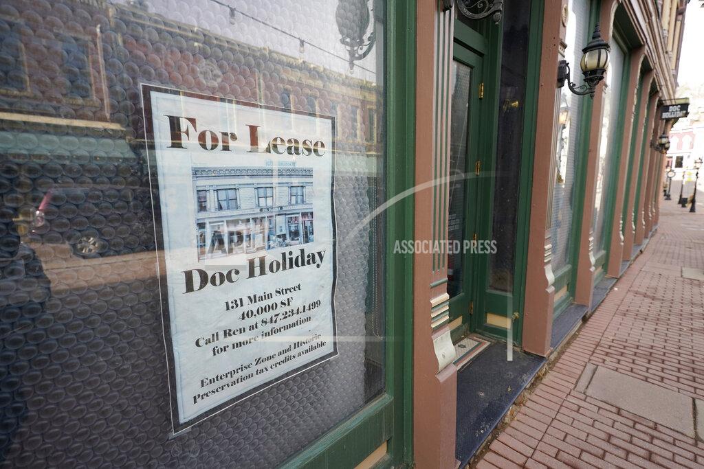 David Zalubowski A lease sign hangs on the window of a shuttered casino along Main Street Wednesday, Nov. 18, 2020, in the gaming town of Central City, Colo. The building has been vacant for several years since the casino's closure. (AP Photo/David Zalubowski)