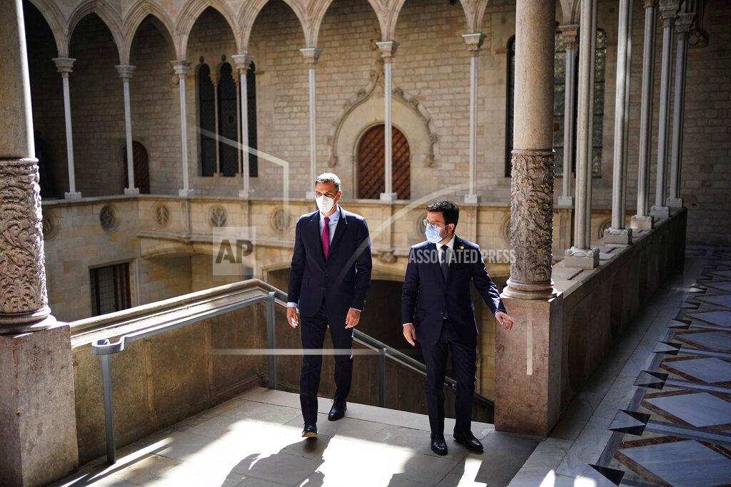 Joan Mateu Parra Spanish Prime Minister Pedro Sanchez and Catalonian regional president Pere Aragonès, right, arrive at the headquarter of the Government of Catalonia in Barcelona, Spain, Wednesday, Sept. 15, 2021. Spain's prime minister and the leader of Catalonia are restarting negotiations in hopes of finding a solution to the ongoing political crisis caused by the region's separatist movement. (AP Photo/Joan Mateu Parra)