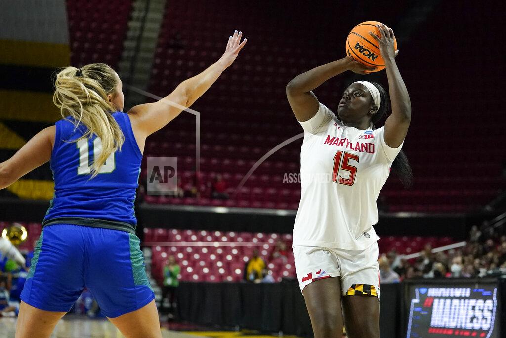 Julio Cortez Maryland guard Ashley Owusu (15) shoots against Florida Gulf Coast guard Kendall Spray (10) during the second half of a college basketball game in the second round of the NCAA tournament, Sunday, March 20, 2022, in College Park, Md. Maryland won 89-65. (AP Photo/Julio Cortez)