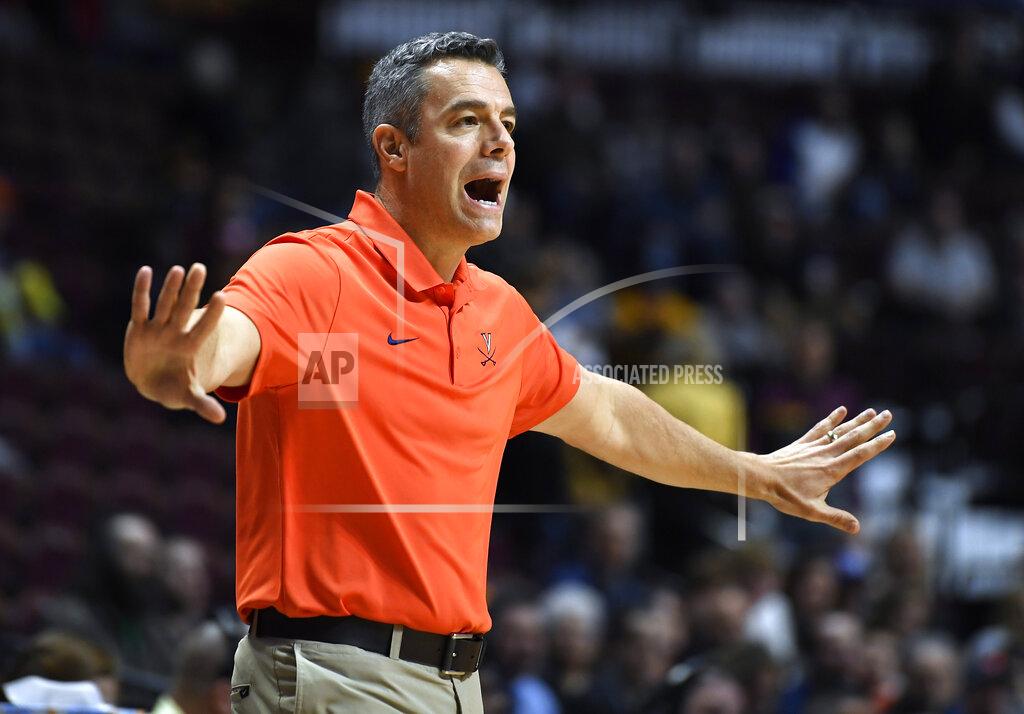 Jessica Hill Virginia head coach Tony Bennett reacts during the first half of an NCAA college basketball game against Arizona State, Sunday, Nov. 24, 2019, in Uncasville, Conn. (AP Photo/Jessica Hill)