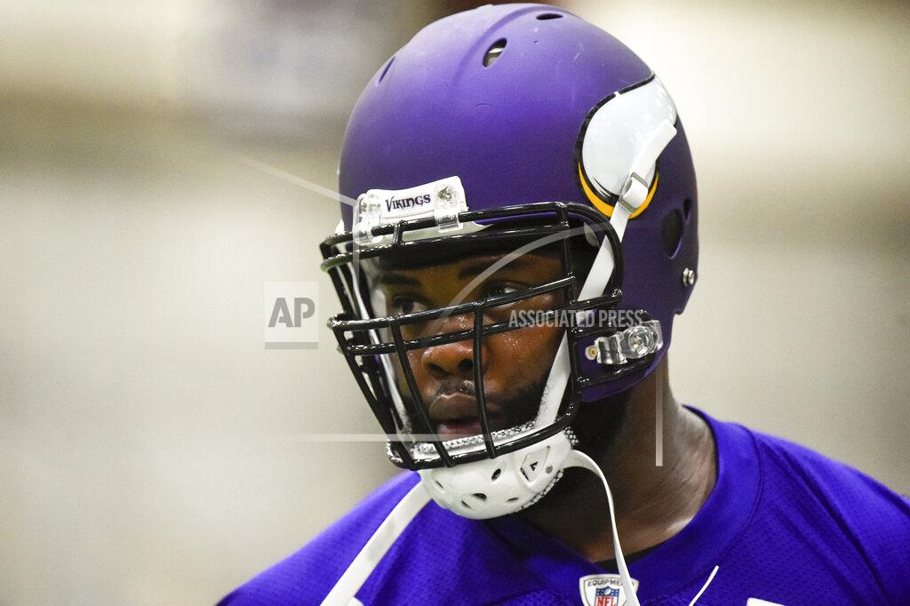 FILE - In this May 25, 2016, file photo, Minnesota Vikings defensive tackle Linval Joseph works out during NFL football practice in Eden Prairie, Minn. The salary-cap-strapped Minnesota Vikings have terminated the contracts of two long-time starters: nose tackle Linval Joseph and cornerback Xavier Rhodes. The move will clear more than $18.5 million off the team's salary cap. (AP Photo/Craig Lassig, File)