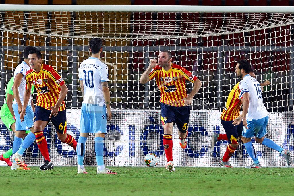 Donato Fasano Lecce's Fabio Lucioni, 3rd from right, celebrates after scoring his side's 2nd goal during the Serie A soccer match between Lecce and Lazio at the Stadio del Mare in Lecce, Italy, Tuesday, July 7, 2020. (Donato Fasano/LaPresse via AP)