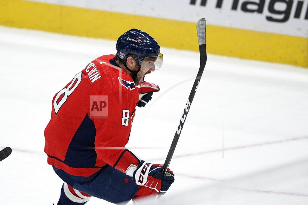 Nick Wass Washington Capitals left wing Alex Ovechkin (8), of Russia, celebrates his game-winning goal in overtime of an NHL hockey game against the Boston Bruins, Saturday, Jan. 30, 2021, in Washington. The Capitals won 4-3 in overtime. (AP Photo/Nick Wass)