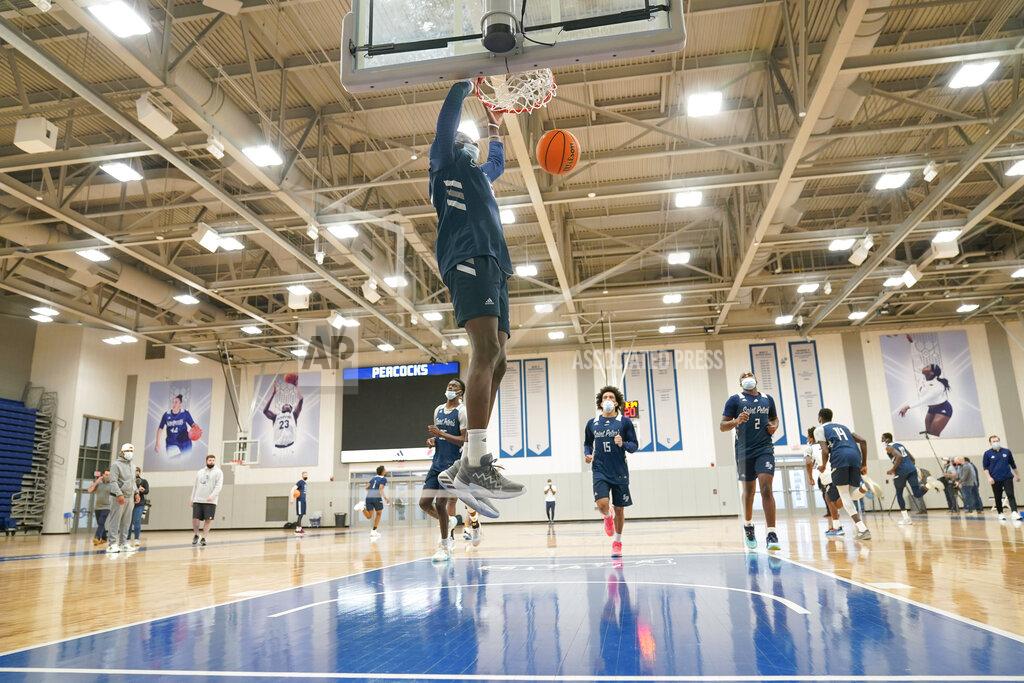 Seth Wenig St. Peter's Clarence Rupert participates in a drill during NCAA college basketball practice in Jersey City, N.J., Tuesday, March 22, 2022. (AP Photo/Seth Wenig)