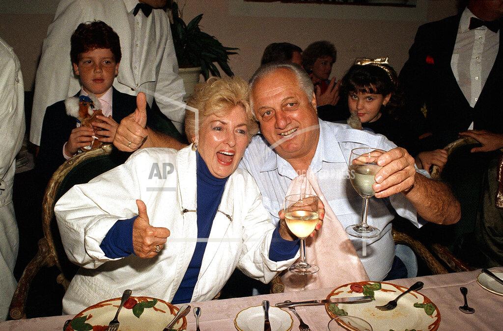 Reed Saxon FILE - Los Angeles Dodgers manager Tommy LaSorda and his wife, Jo, give the thumbs up sign and a toast at a gathering of friends and associates to celebrate winning the 1988 World Series the day before at a Los Angeles restaurant, in this Friday, Oct. 21, 1988. file photo. Jo Lasorda has died. She was 91. She died Monday night, Sept. 20, 2021, at her home in Fullerton, the team said Tuesday. No cause of death was given. (AP Photo/Reed Saxon, File)