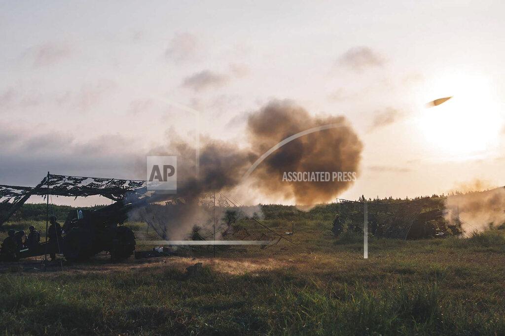Uncredited In this photo released by the Taiwan Military News Agency, Taiwan artillery unit conducts a live firing drill to deter a coastal landing force during the Han Guang exercise held on the island of Penghu county, Taiwan, Wednesday, Sept. 15, 2021. Taiwan's annual five-day Han Guang military exercise is designed to prepare the island's forces for an attack by China, which claims Taiwan as part of its own territory. (Military News Agency via AP)