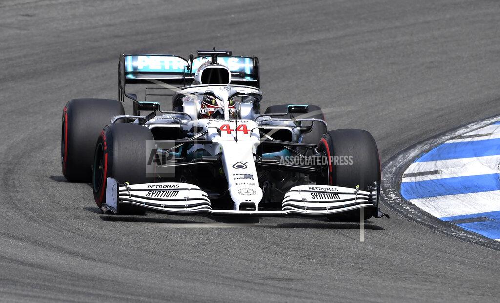 Hamilton takes pole position at German GP; Ferrari struggles