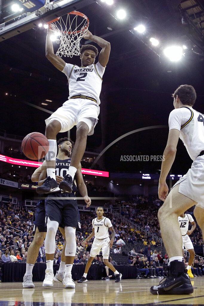 Charlie Riedel Missouri forward Tray Jackson (2) dunks during the first half of an NCAA college basketball game against Butler, Monday, Nov. 25, 2019, in Kansas City, Mo. (AP Photo/Charlie Riedel)