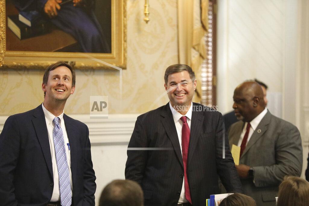 Jeffrey Collins South Carolina Rep. Murrell Smith, R-Sumter, right, and Sen. Thomas McElveen, D-Sumter, left, look into the House balcony before Smith was chosen as speaker-elect on Thursday, April 28, 2022, in Columbia, S.C. (AP Photo/Jeffrey Collins)